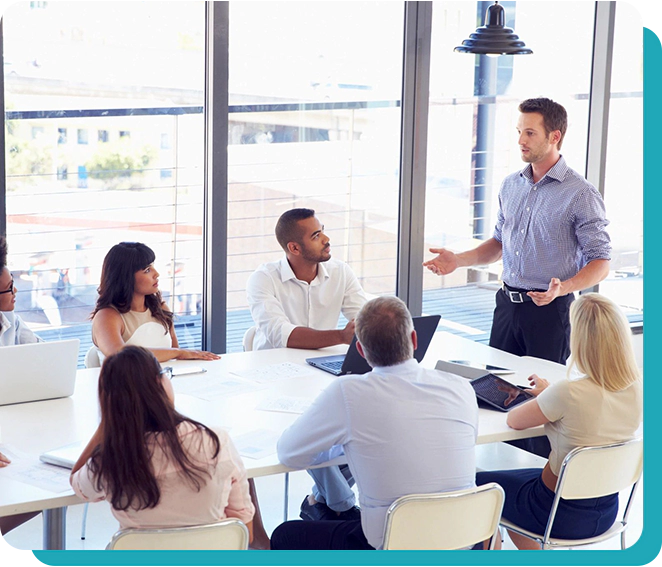 A group of people sitting around a table.