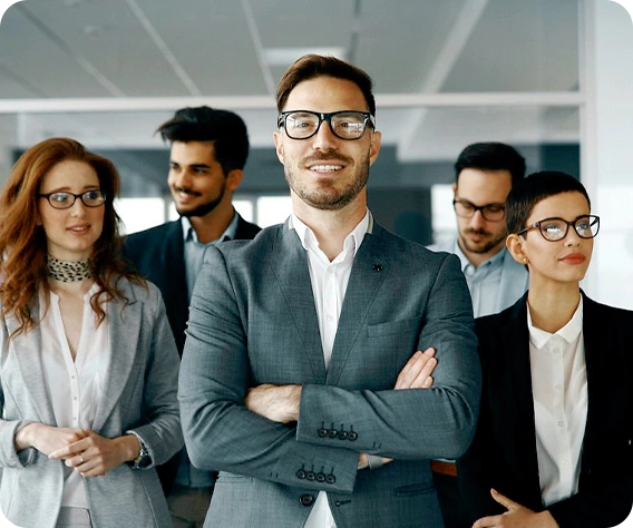 A group of people standing around each other.